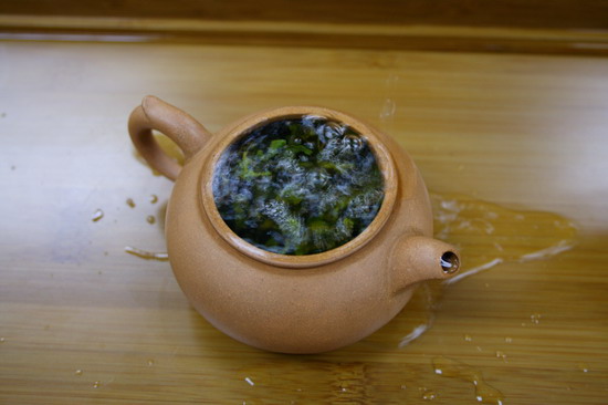 The tea leaves start expands in the tea pot and emit its aroma.