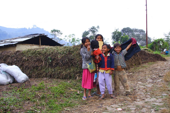 The Kids of the village playing at the compost making area.