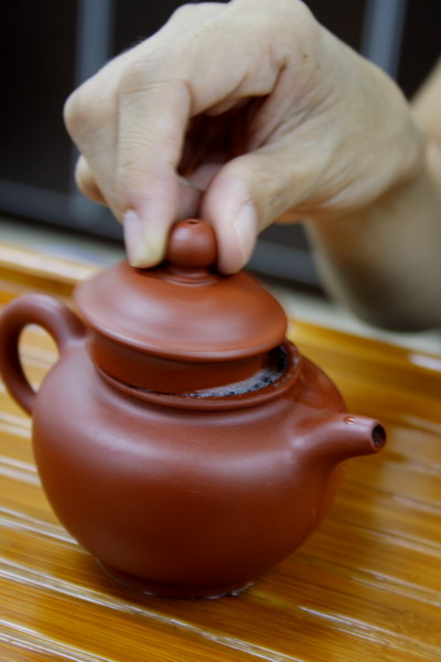 Gently remove the bubble by using the lid.